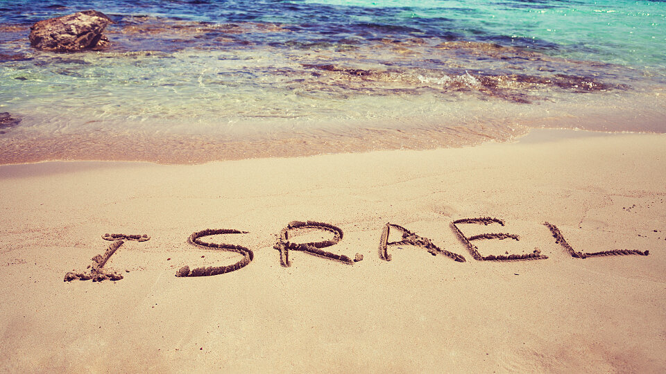 inscription israel on beach sand sbi 300875159